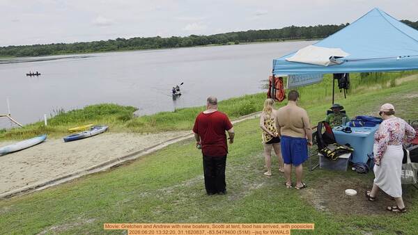 [Movie: Gretchen and Andrew with new boaters, Scotti at tent, food has arrived, with popsicles, 2026:06:20 13:32:20, 31.1620837, -83.5479400 (51M) --jsq for WWALS]