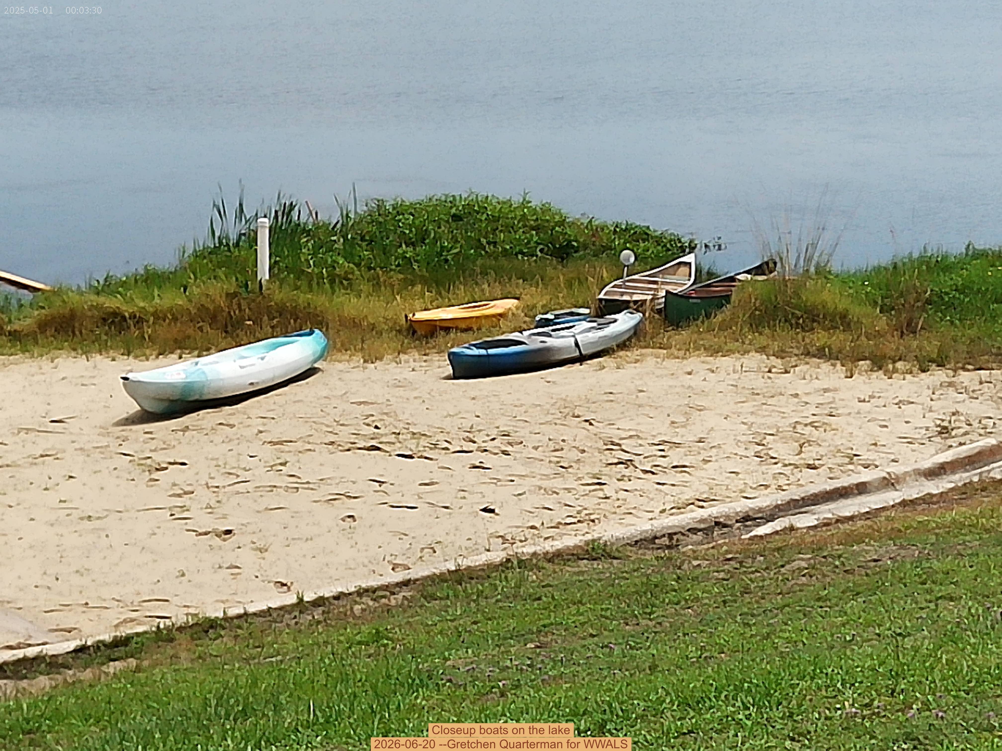 Closeup boats on the lake, 2026-06-20 --Gretchen Quarterman for WWALS