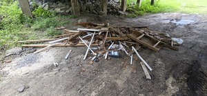 [Pile of construction debris under Hagan Bridge, 2026:06:26 11:48:51, 31.0141018, -83.3010614]