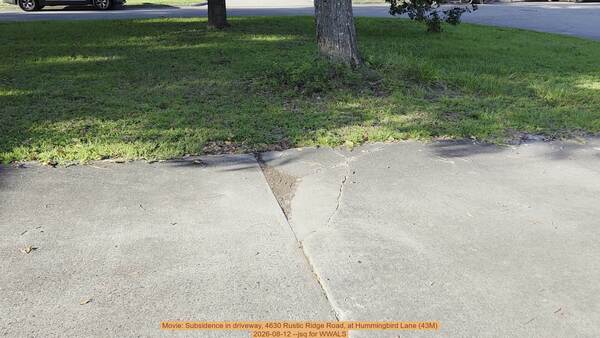 Movie: Subsidence in driveway, 4630 Rustic Ridge Road, at Hummingbird Lane (43M), 2026-08-12 --jsq for WWALS