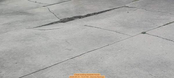 [Crack looking towards house, 2026-05-31, 13:31:54 --Dennis Norman]