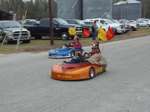[Tiny orange car]
